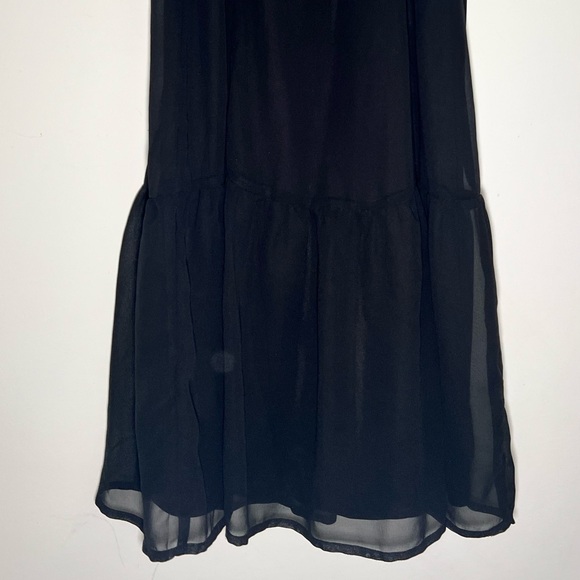 Fitted black spaghetti strap dress and corset and ruffle detail and tiered skirt - Picture 8 of 8